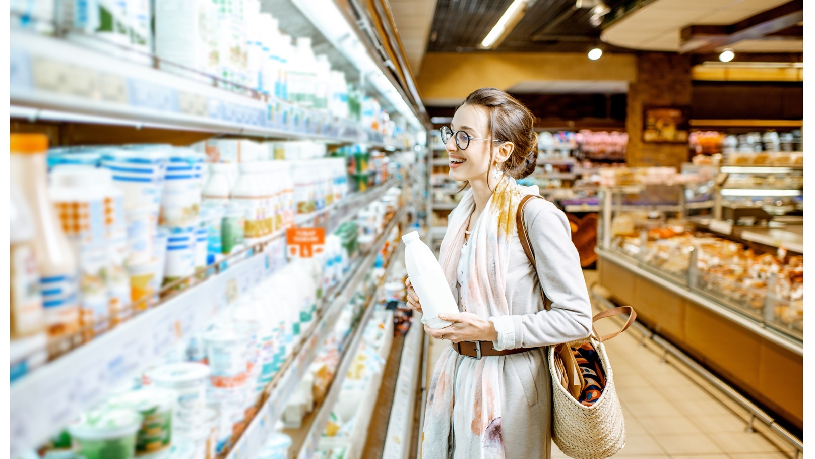 woman-buying-milk-in-the-supermarket-2021-09-02-07-25-06-utc