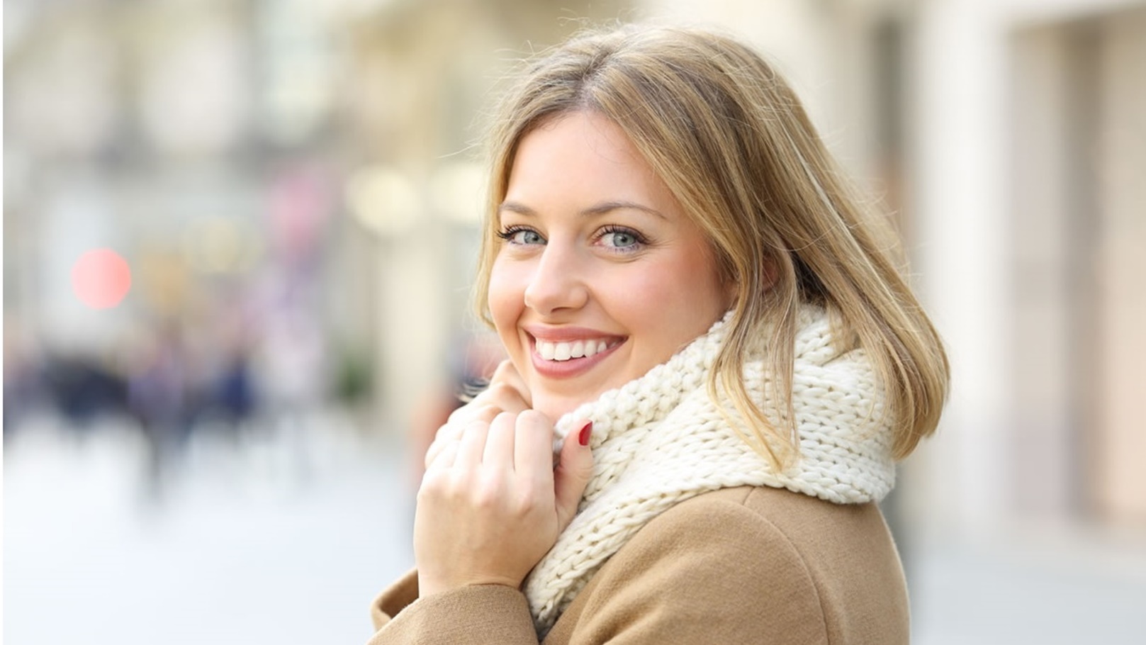 smiling-woman-on-winter-street