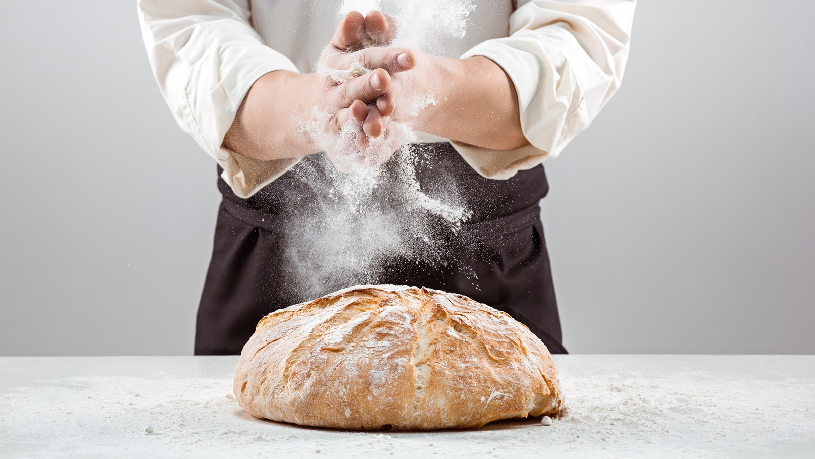 the-male-hands-in-flour-and-rustic-organic-loaf-of-2021-08-26-17-42-13-utc