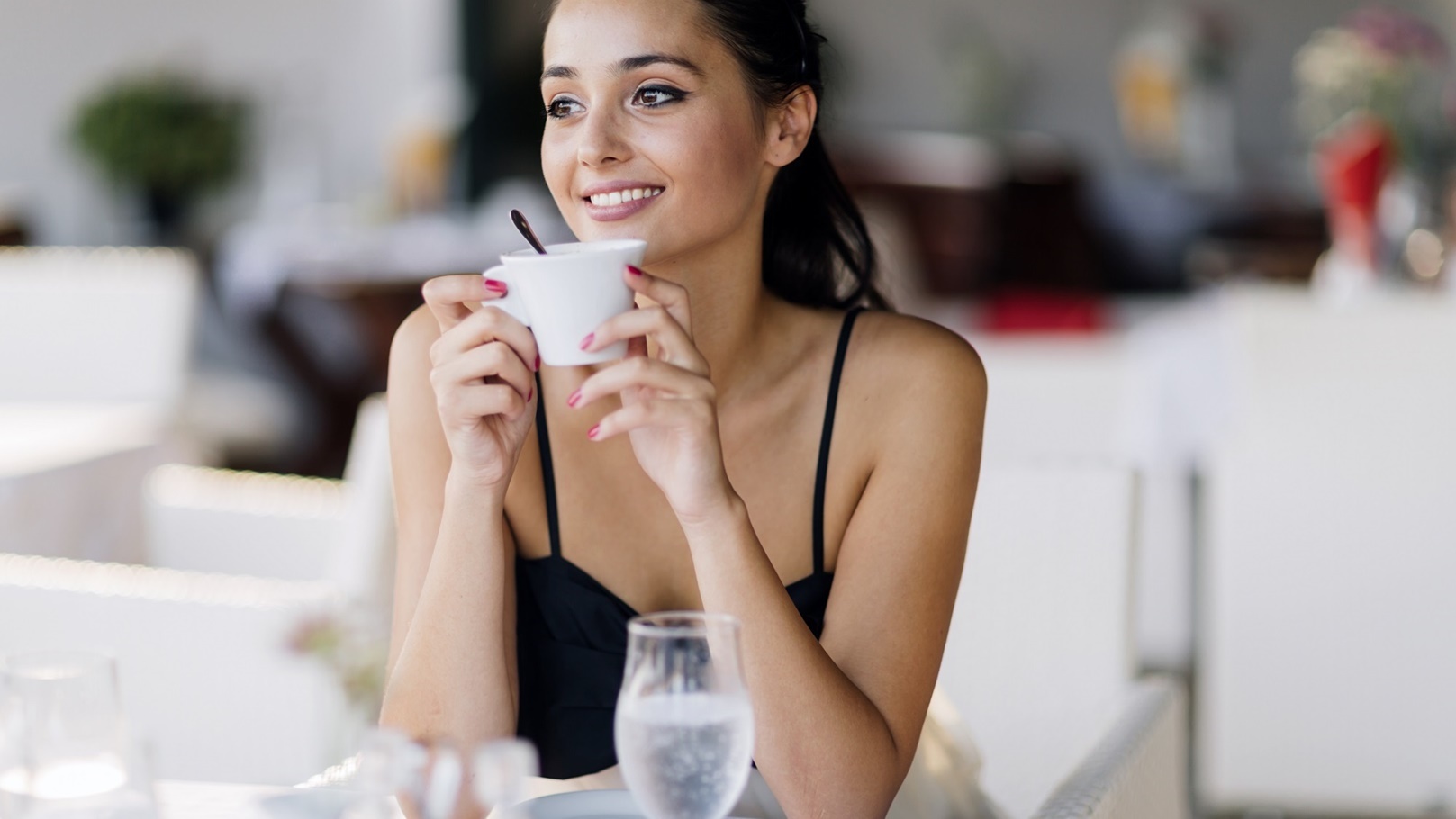beautiful-women-drinking-tea-in-restaurant-2021-08-28-08-34-39-utc