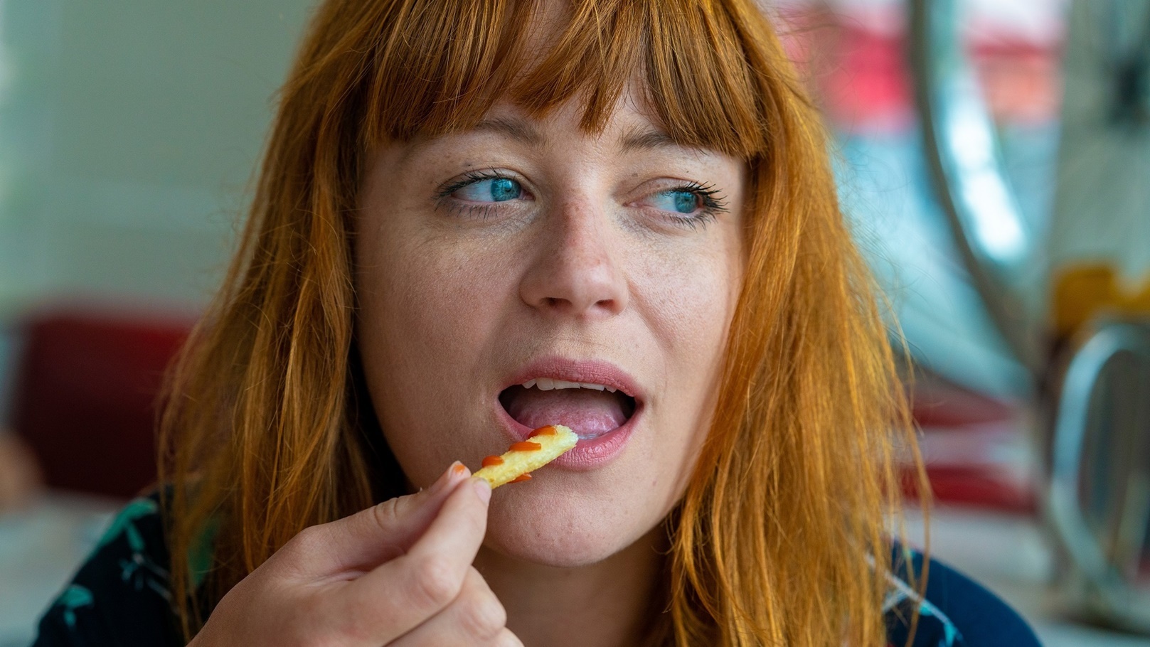 portrait-of-ginger-girl-with-blue-eyes-on-a-floral-2021-08-26-19-00-51-utc