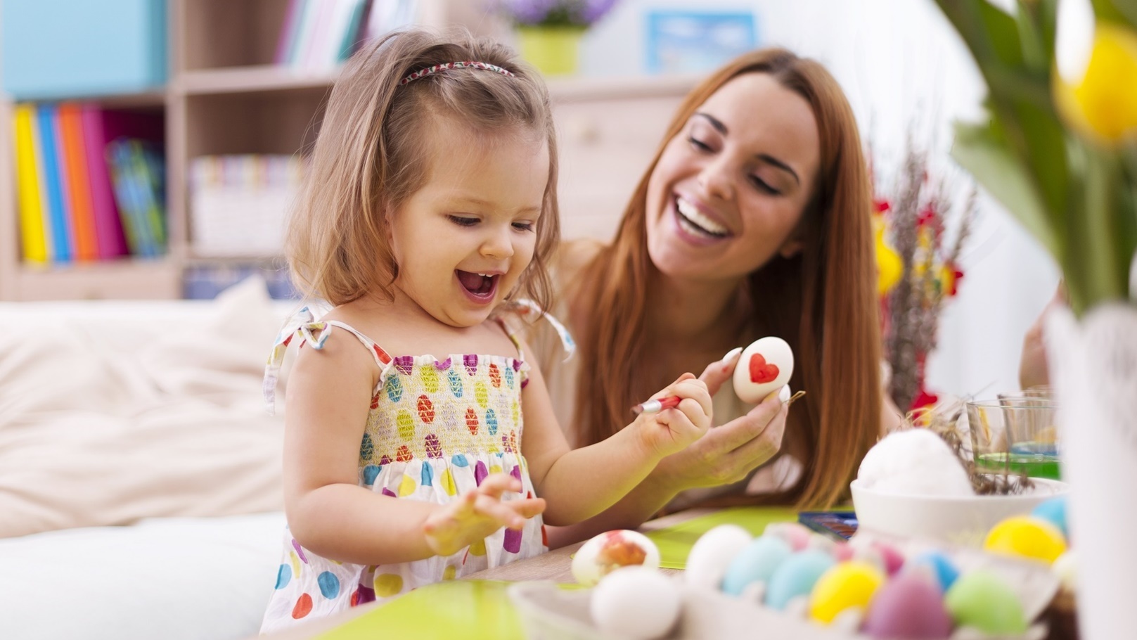 loving-mother-and-her-baby-painting-easter-eggs-2022-02-02-04-50-59-utc