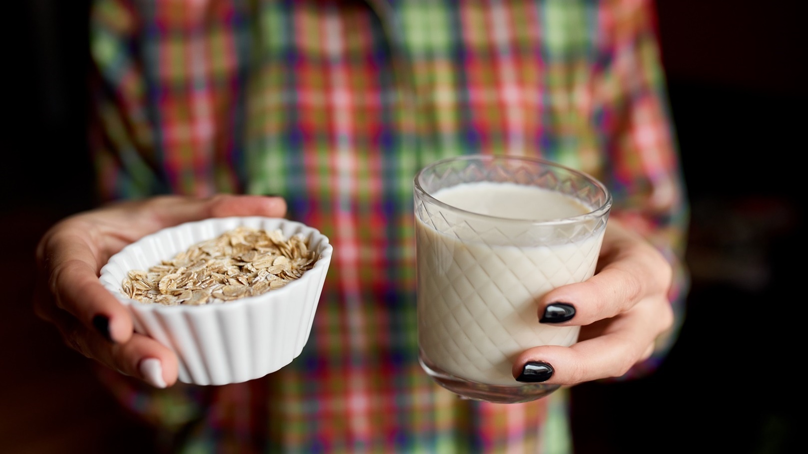 female-hands-with-glasse-of-vegan-oat-milk-altern-2021-10-21-01-46-38-utc